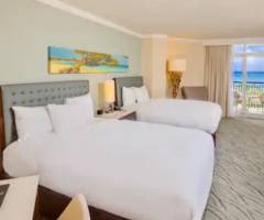 Casino Aruba at Hilton: Vista parcial al mar Palm-Beach club 2 camas queen